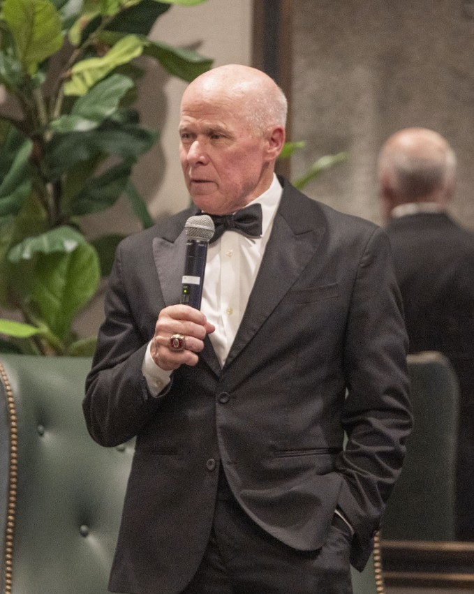 A speaker introducing Coach Richt onto the stage at the 2026 St. Mary’s Celebration of Courageous Leaders Gala (Photo Credit: Wingate Downs)