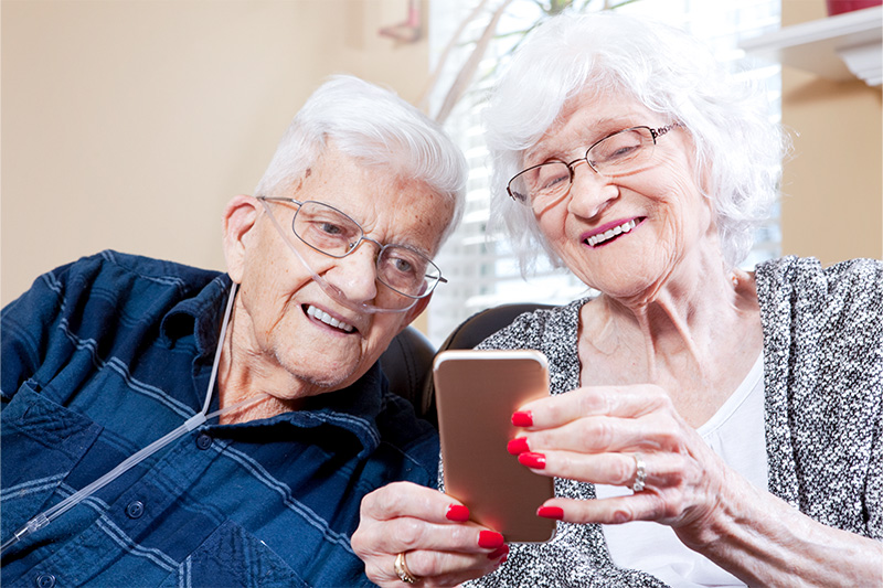 Older couple ordering their medications online.